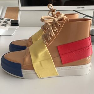 Wore once *Melissa* London purchased sneakers